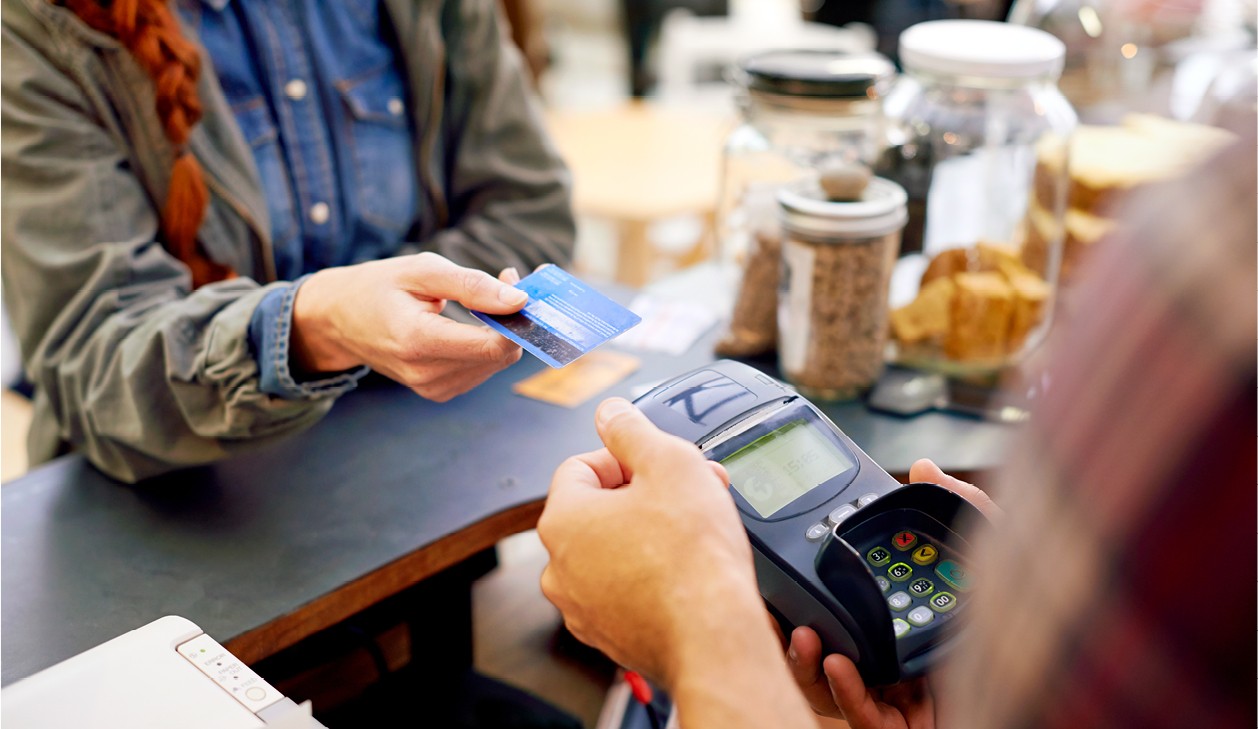 Paying with a merchant processing system